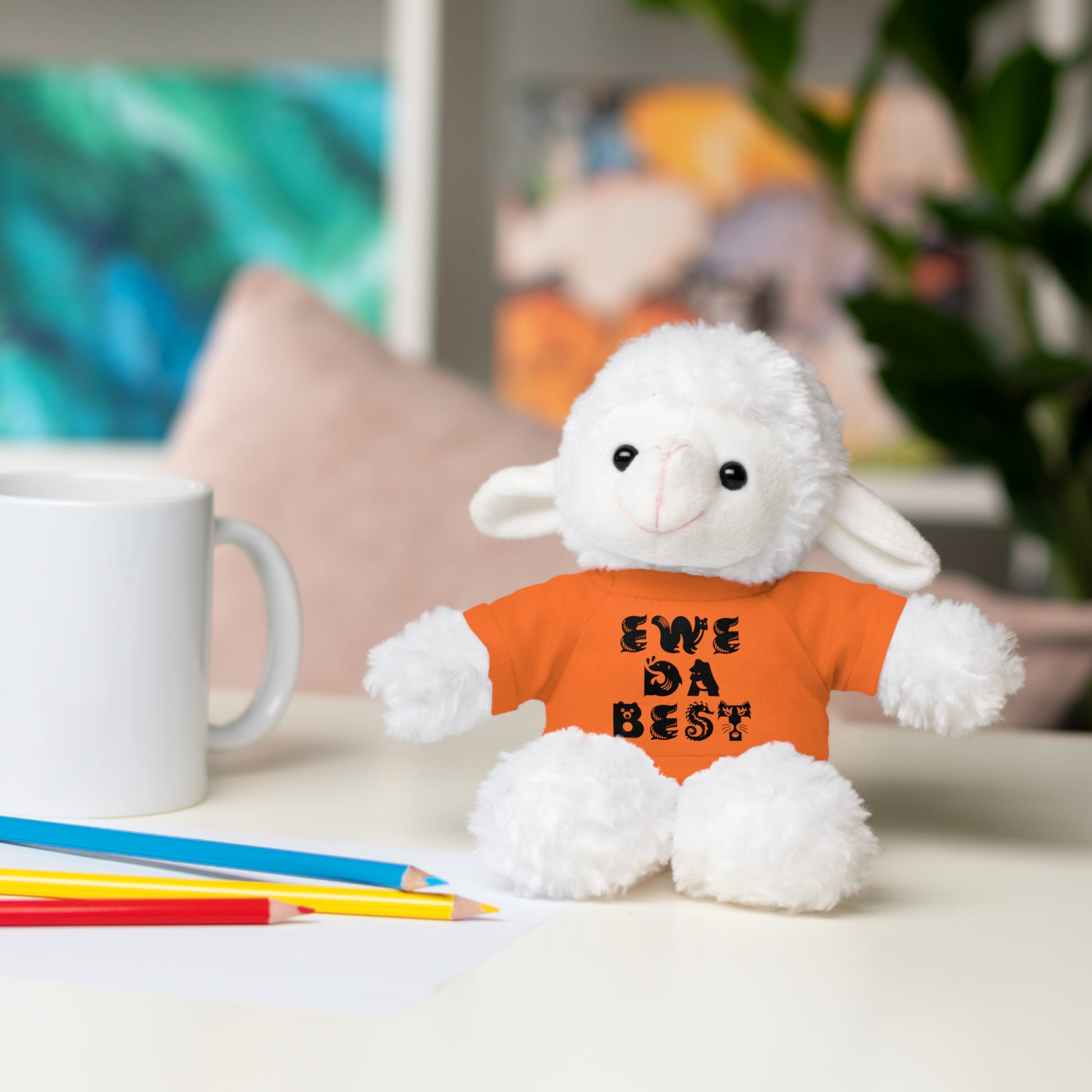 Sheep with orange t-shirt reading "Ewe da best"