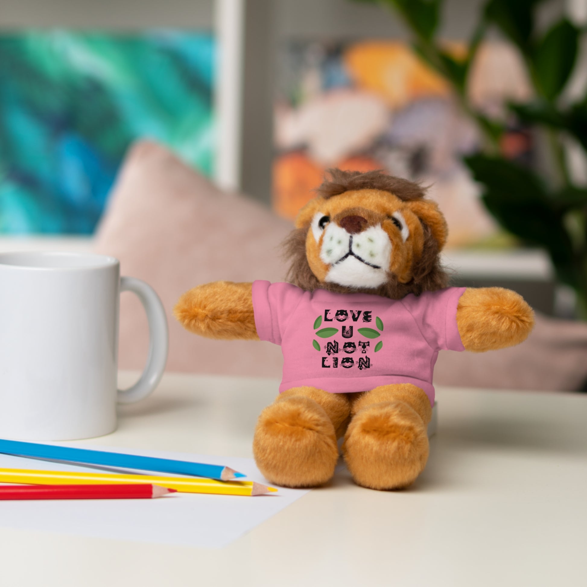 Lion with pink t-shirt reading "Love U Not Lion"